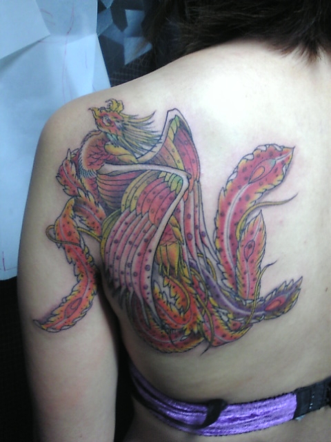 tattoo on back girl. Tattoo Design On Back Girl
